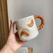 Twisted-Handle Croissant Ceramic Cup, 350 ml, Relief Detailing - detail 3